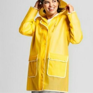 Yellow raincoat unisex Hunter New without tag. Size M. Sold out in stores